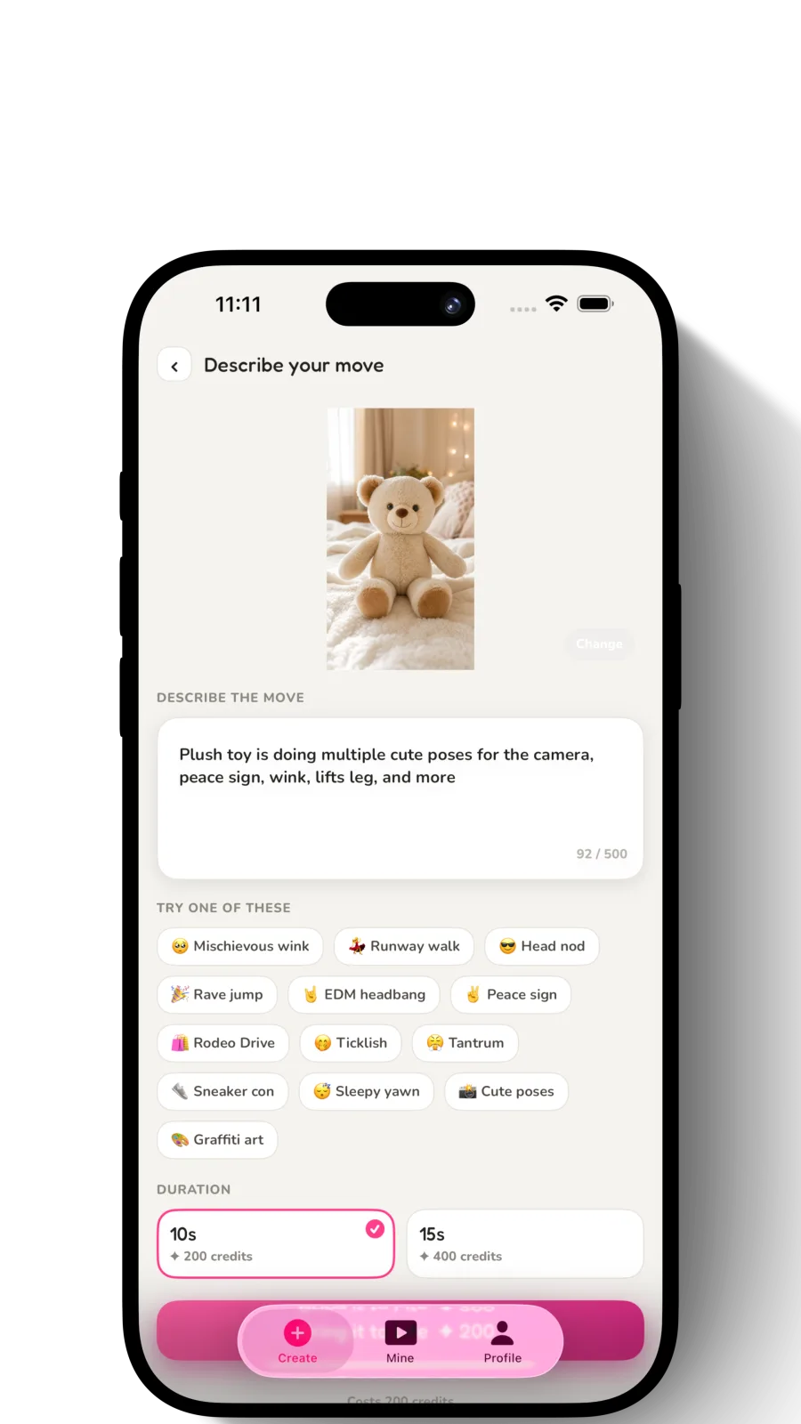 The PlushMation describe-your-move screen: a photo of a teddy bear above a text box with a described motion, and tappable move suggestions like Runway walk and Peace sign